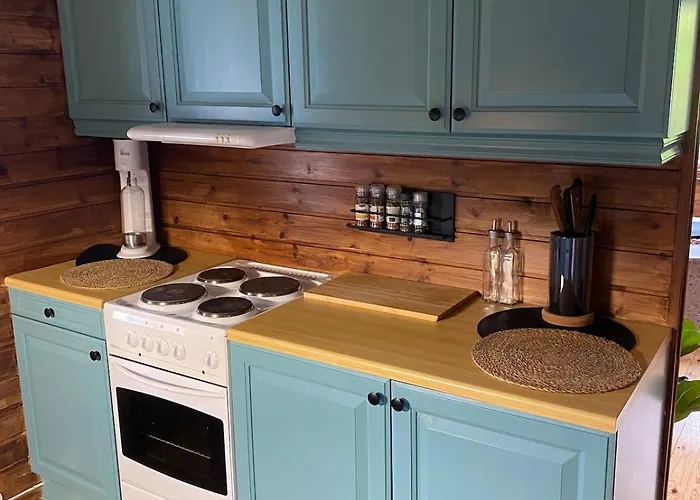 By Oppstrynsvatnet, Hjelle